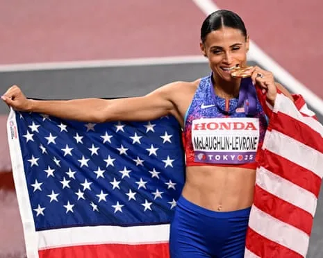 The American sprinter clocks quickest women’s 400m in fourty years to secure gold